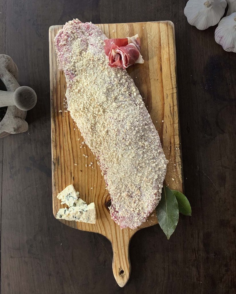 Cachopo, cachopo asturiano, cachopo tradicional, cachopo listo para cocinar, cachopo grande, carne empanada, carne rellena empanada, comida tradicional española, cocina asturiana.